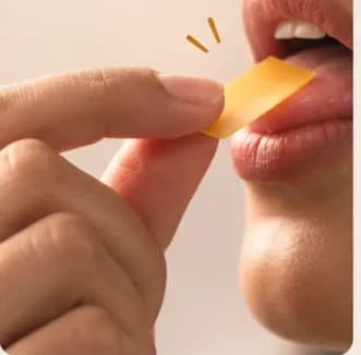 Place one strip on your tongue